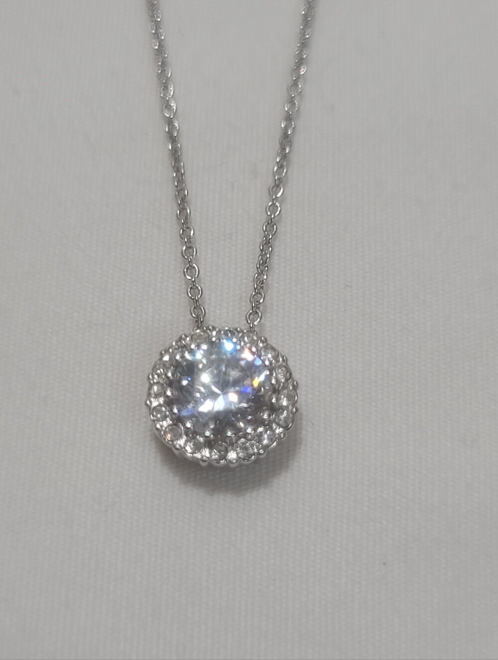 Nadri Sparkling Cubic Zirconia Halo Pendant Necklace in Silver
